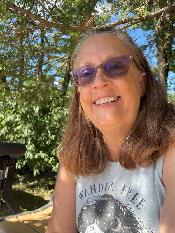 Kathy relaxing outside